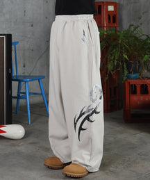メタルプリント トライバルワイドスウェットパンツ