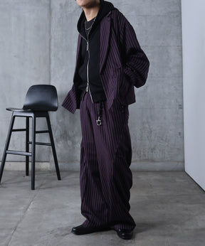 スラックス スタッズ カーブパンツ