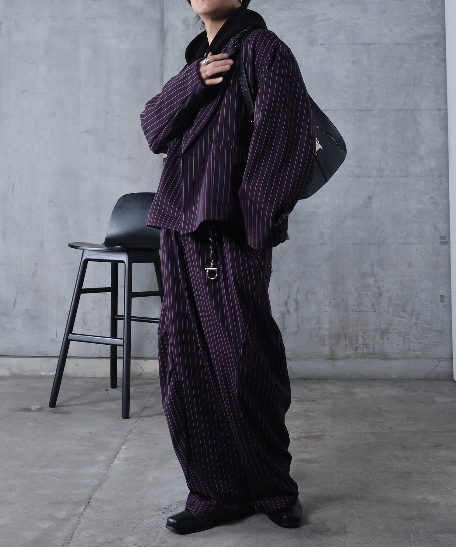 スラックス スタッズ カーブパンツ