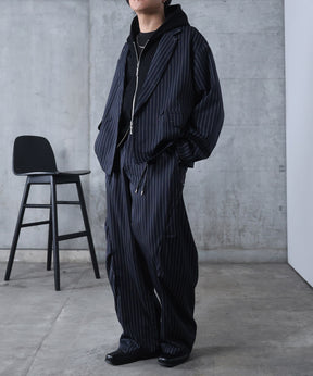 スラックス スタッズ カーブパンツ