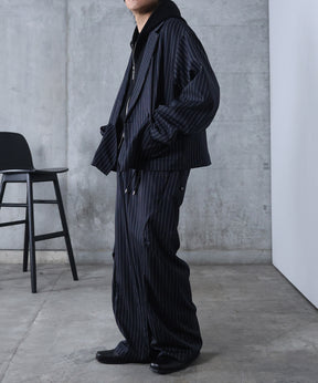 スラックス スタッズ カーブパンツ