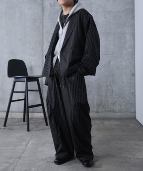 スラックス スタッズ カーブパンツ