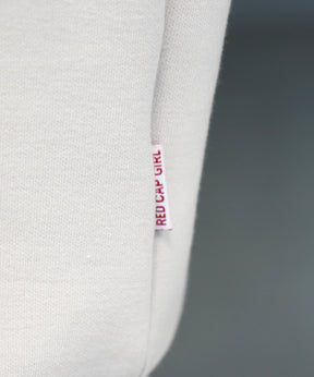 【RED CAP GIRL】25SS ビッグシルエット ドレープとろみ ダンボールニット ワンポイント刺繍ポンチハーフジップ