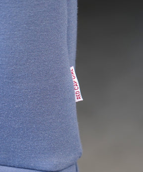 【RED CAP GIRL】25SS ビッグシルエット ドレープとろみ ダンボールニット ワンポイント刺繍ポンチハーフジップ