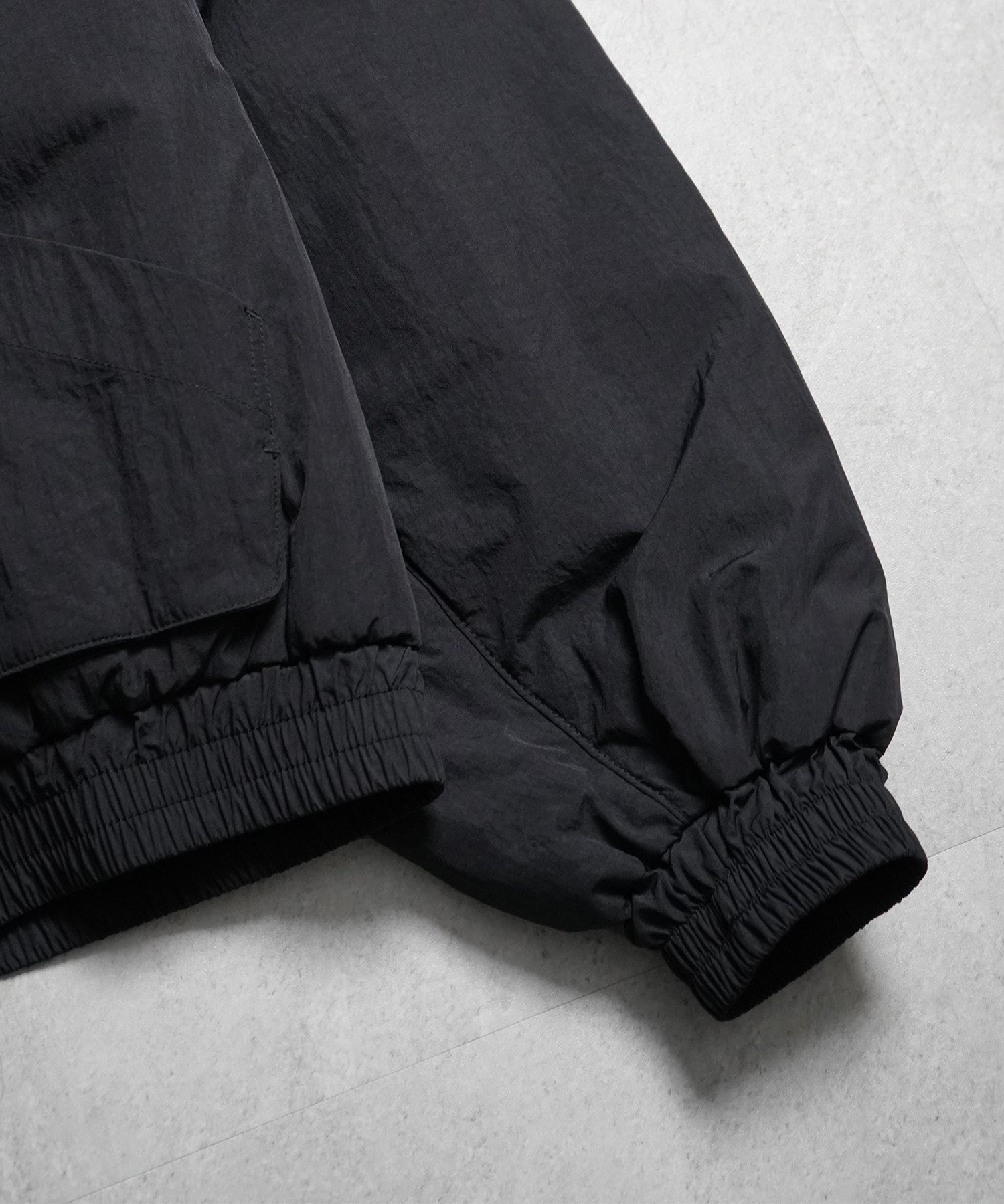 バックプリント ナイロン 中綿ブルゾン