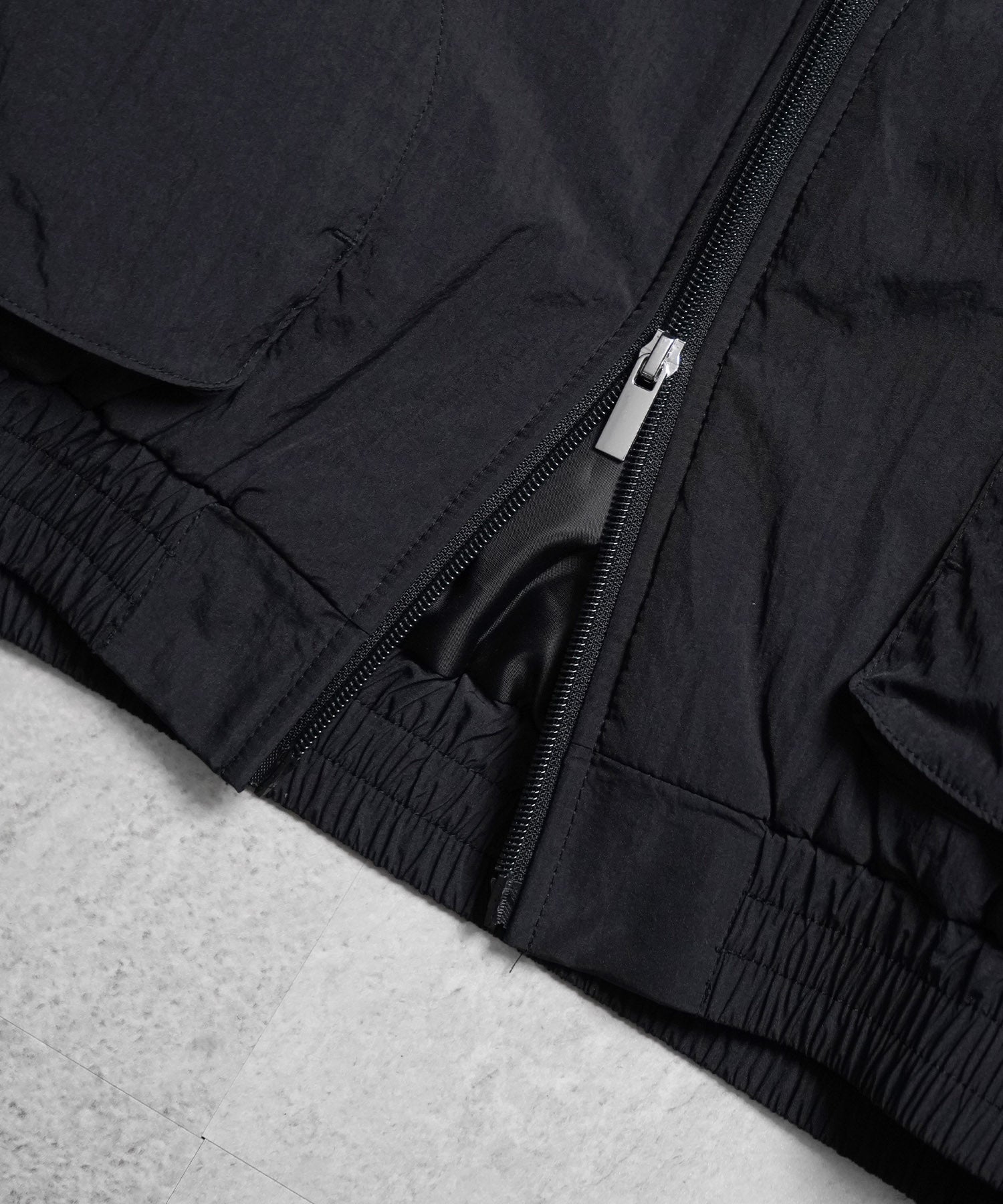 バックプリント ナイロン 中綿ブルゾン