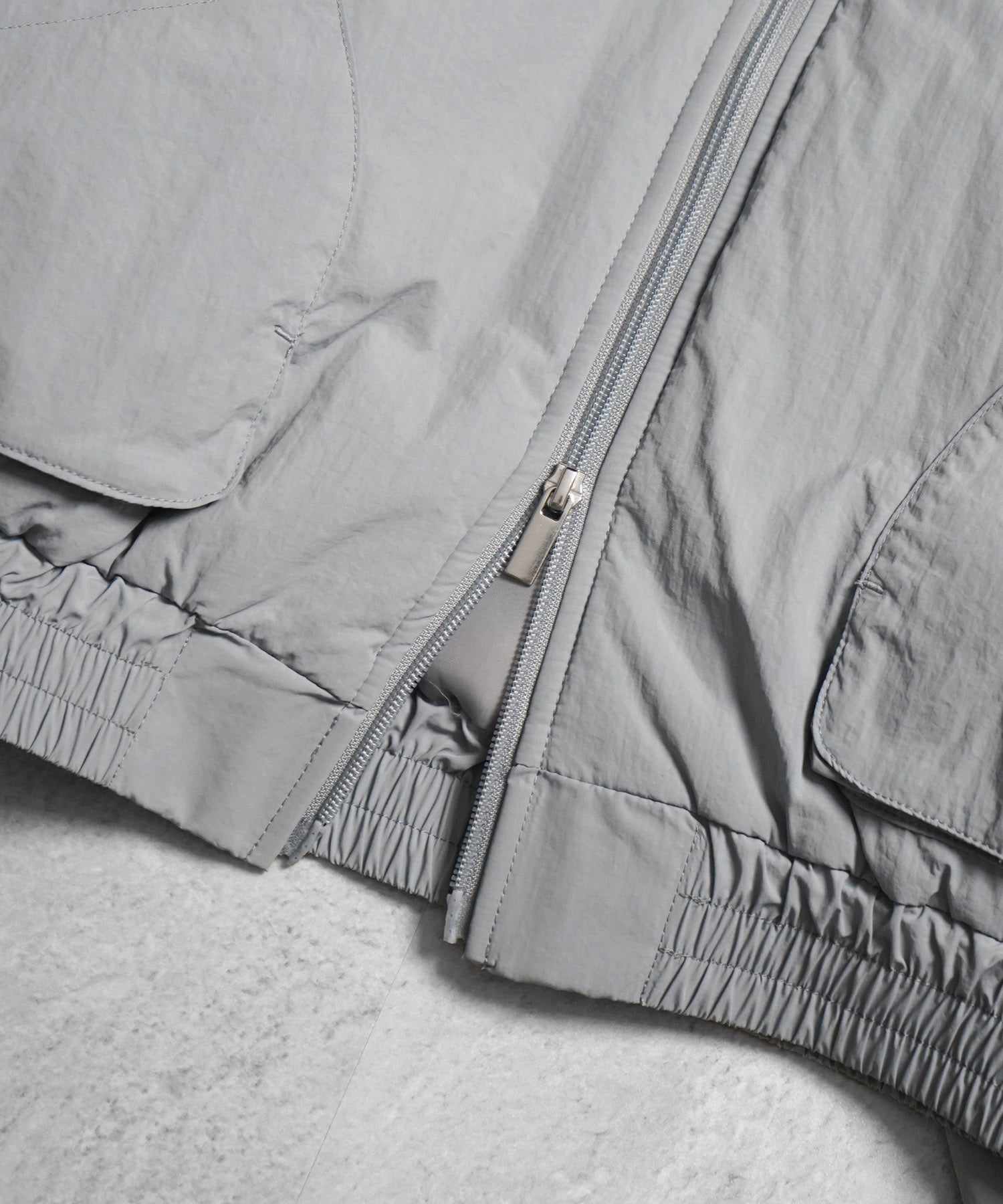 バックプリント ナイロン 中綿ブルゾン