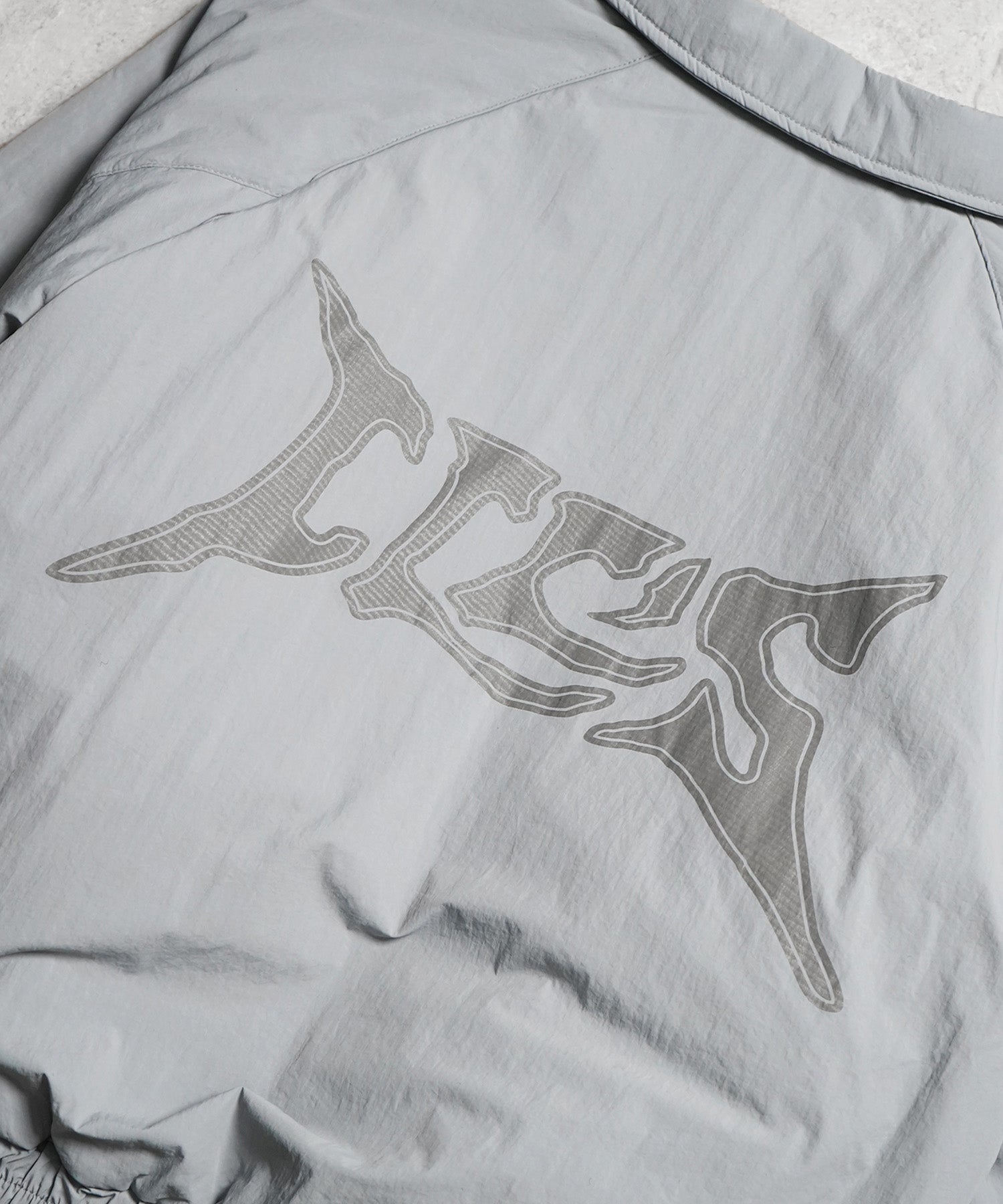 バックプリント ナイロン 中綿ブルゾン