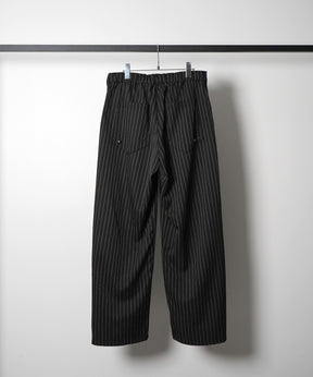スラックス スタッズ カーブパンツ
