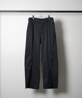 スラックス スタッズ カーブパンツ
