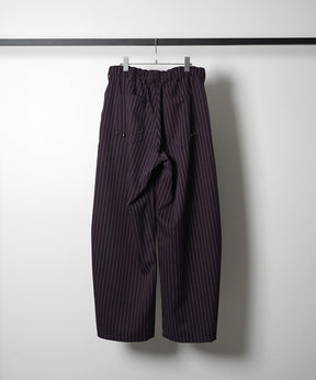 スラックス スタッズ カーブパンツ