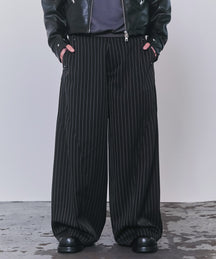 スラックススタッズカーブパンツ