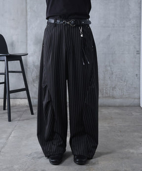 スラックス スタッズ カーブパンツ