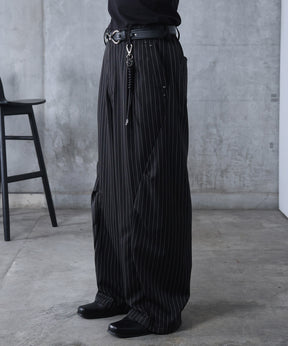 スラックス スタッズ カーブパンツ