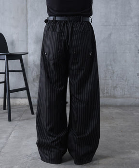 スラックス スタッズ カーブパンツ