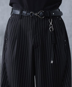 スラックス スタッズ カーブパンツ