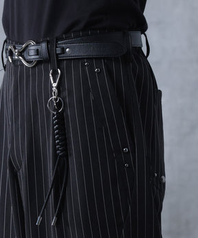 スラックス スタッズ カーブパンツ