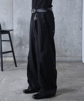 スラックス スタッズ カーブパンツ