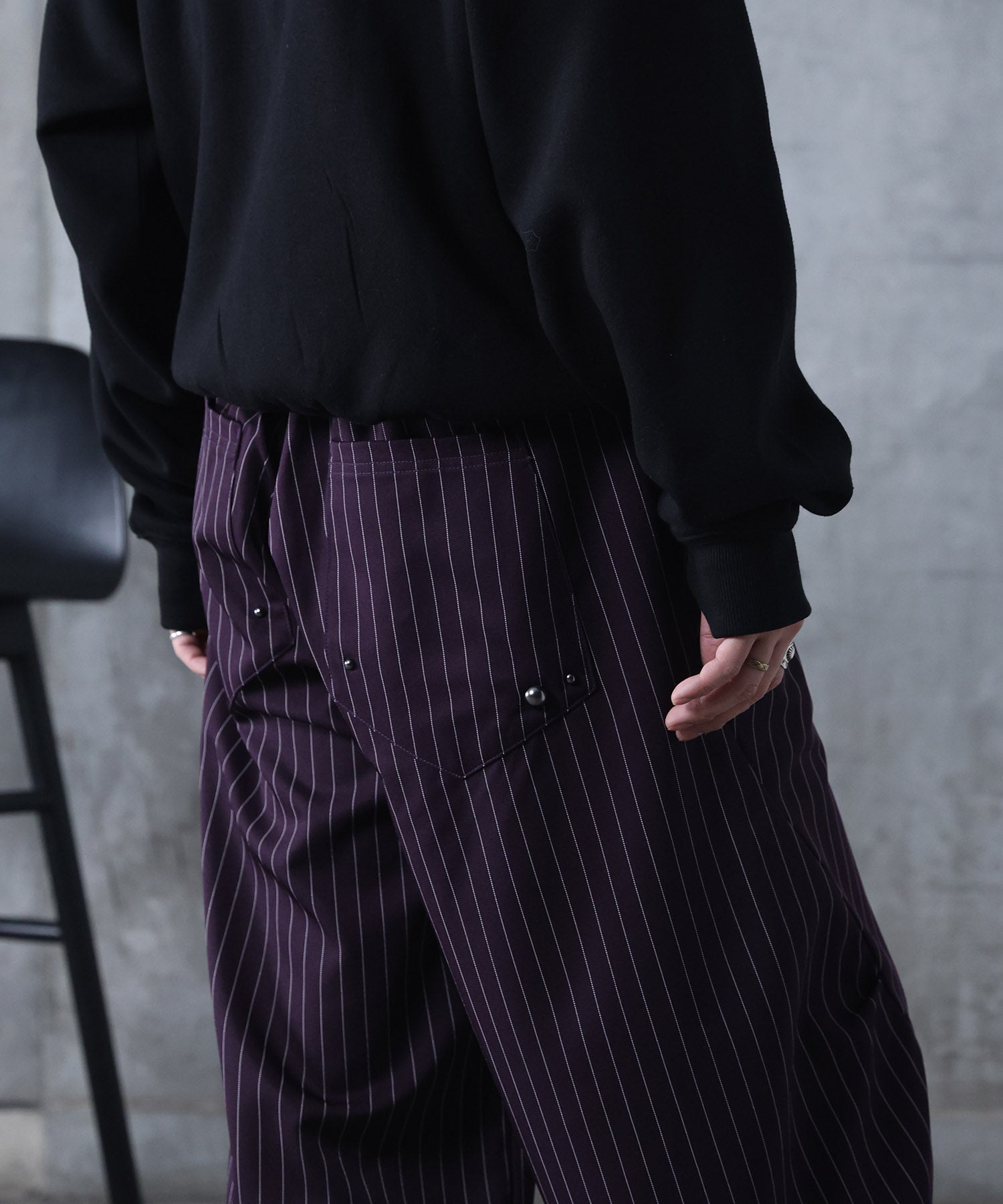 スラックス スタッズ カーブパンツ