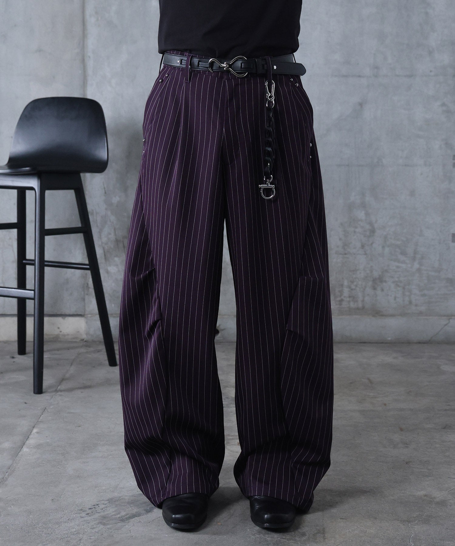 スラックス スタッズ カーブパンツ