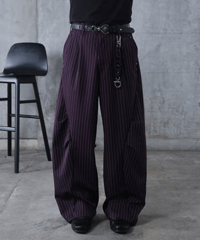 スラックス スタッズ カーブパンツ