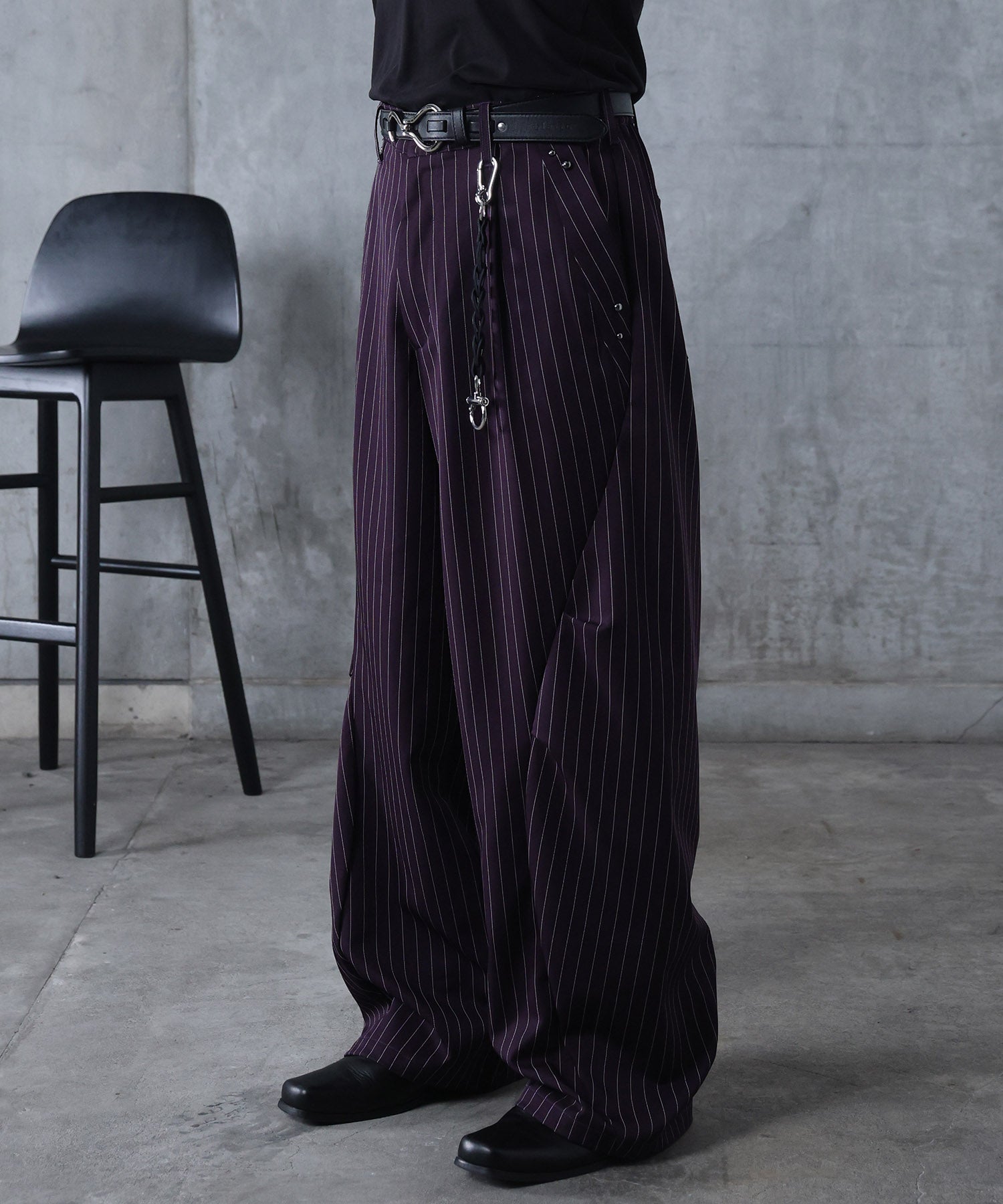 スラックス スタッズ カーブパンツ