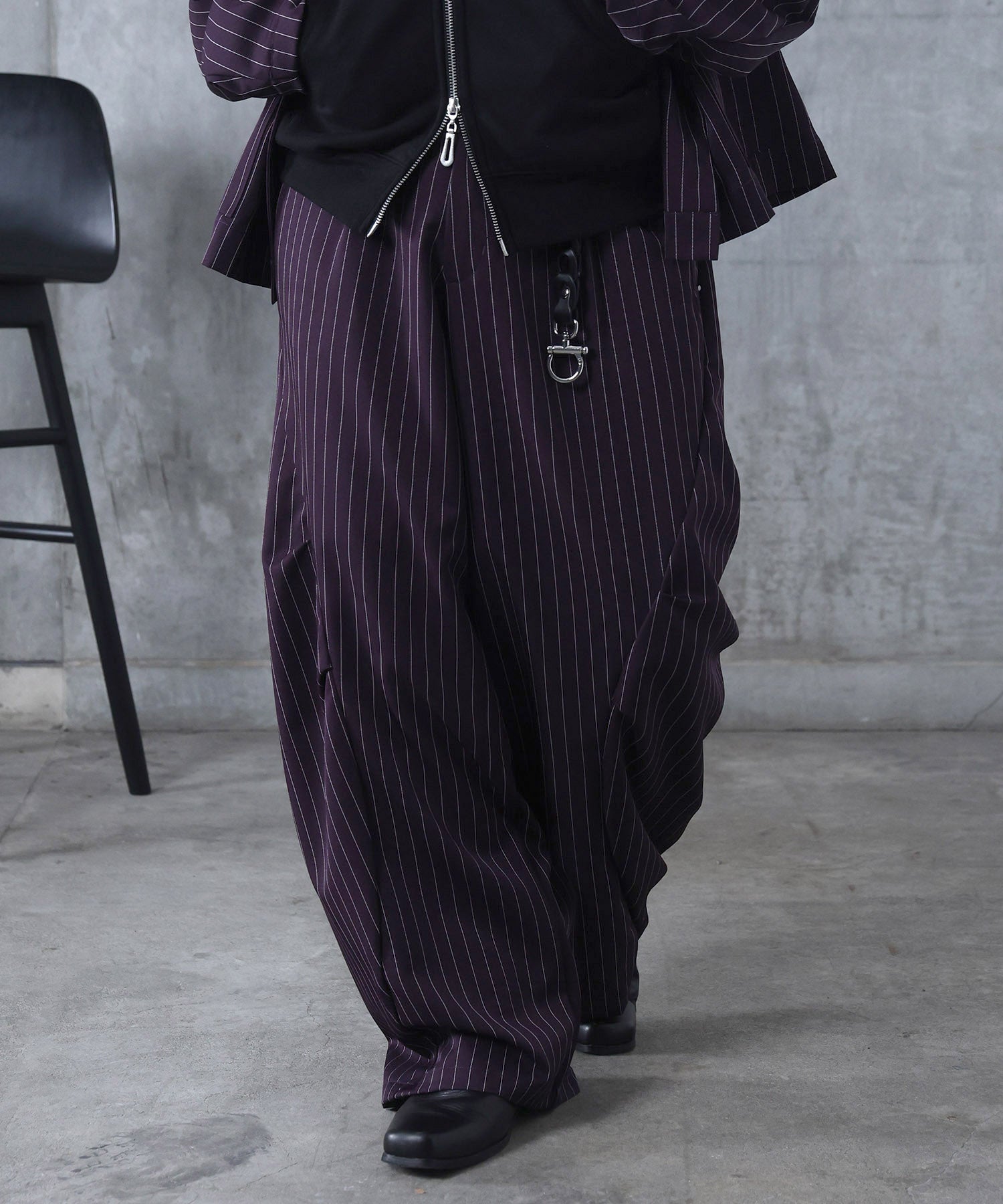 スラックス スタッズ カーブパンツ