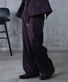 スラックス スタッズ カーブパンツ