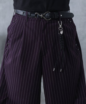 スラックス スタッズ カーブパンツ