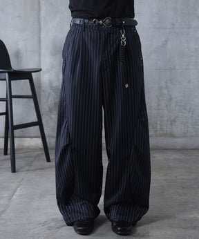 スラックス スタッズ カーブパンツ