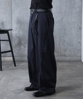 スラックス スタッズ カーブパンツ