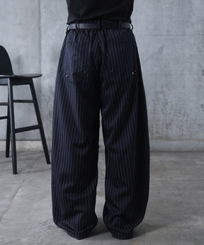 スラックス スタッズ カーブパンツ