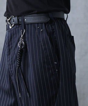 スラックス スタッズ カーブパンツ