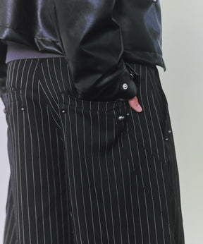 スラックススタッズカーブパンツ