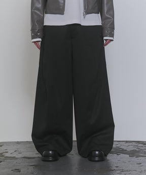 スラックススタッズカーブパンツ