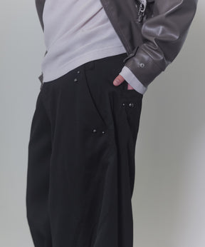 スラックススタッズカーブパンツ